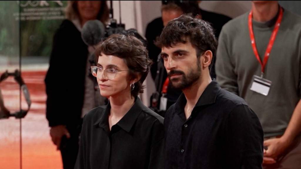 Filmmakers Yuval Abraham and Rachel Szor on the red carpet during the premiere of their documentary NAZA at the Venice Film Festival.