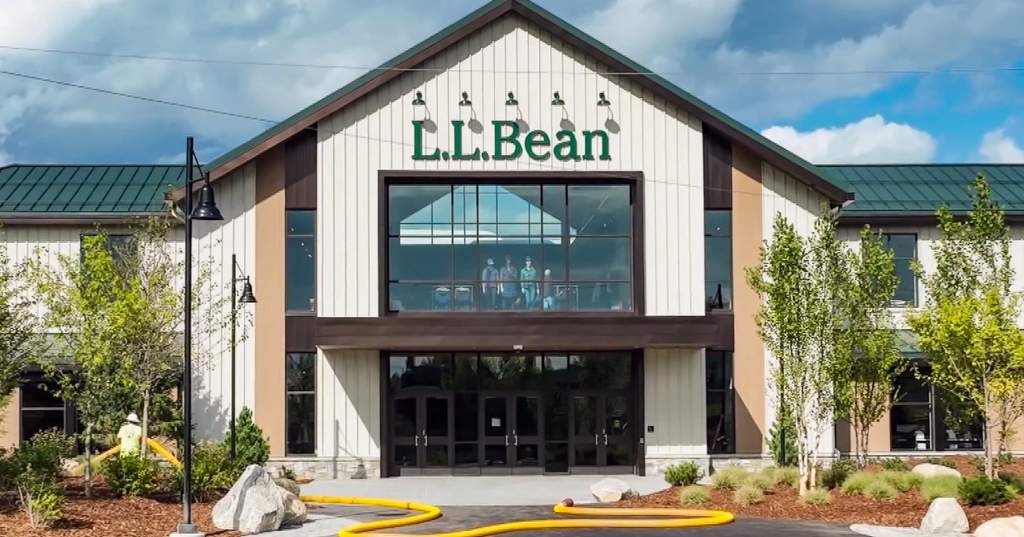 The flagship L.L.Bean retail store located in Freeport, Maine, featuring its iconic giant boot structure outside the entrance during daytime.