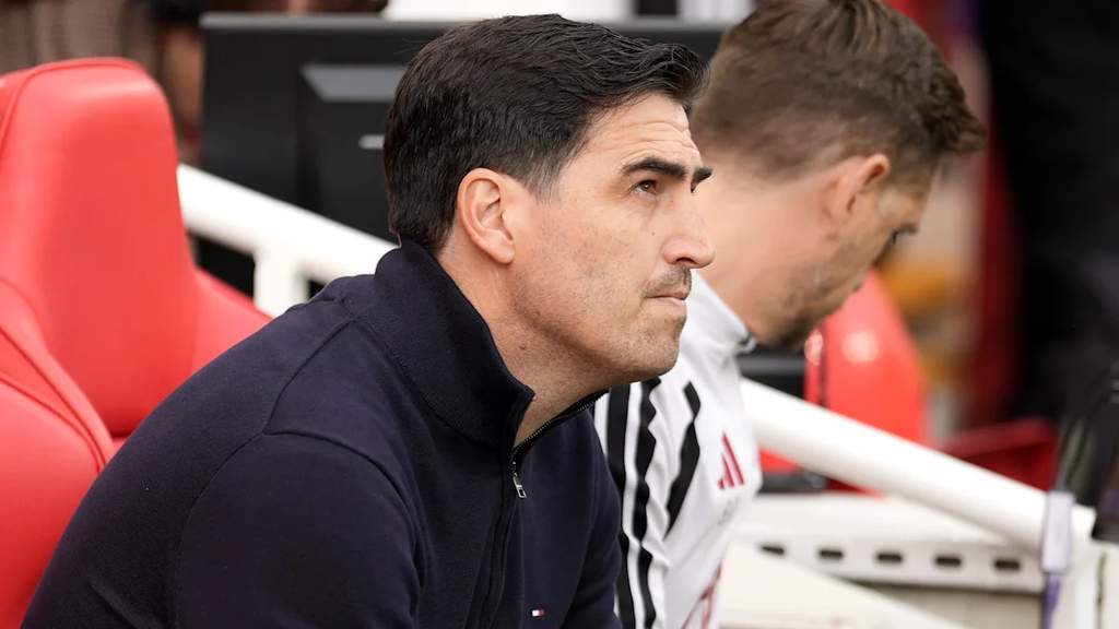Liverpool manager Andoni Iraola standing on the sideline during the Premier League match against Fulham at Anfield.