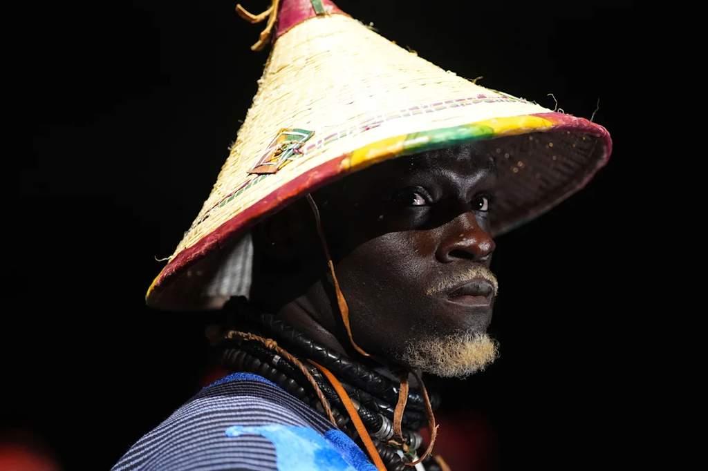 Fighter Moustapha Diakhate wearing traditional Senegalese garb and a jingasa hat inside the PFL cage at UBS Arena in Elmont, New York.