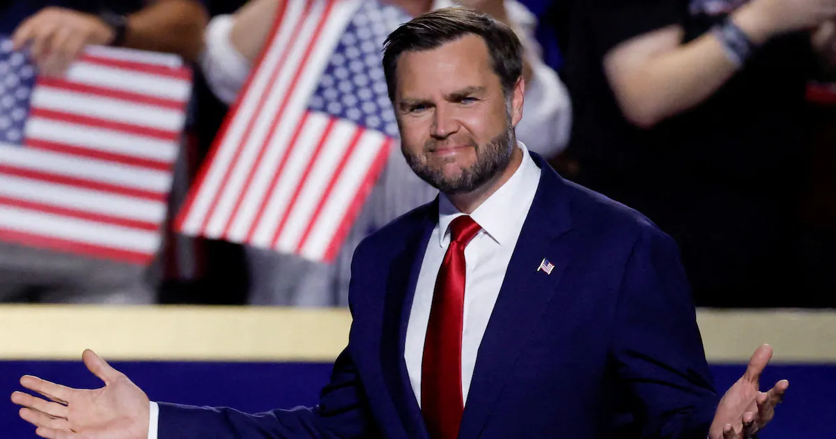 Vice President JD Vance delivering a speech at the political convention while addressing national policy and immigration topics.